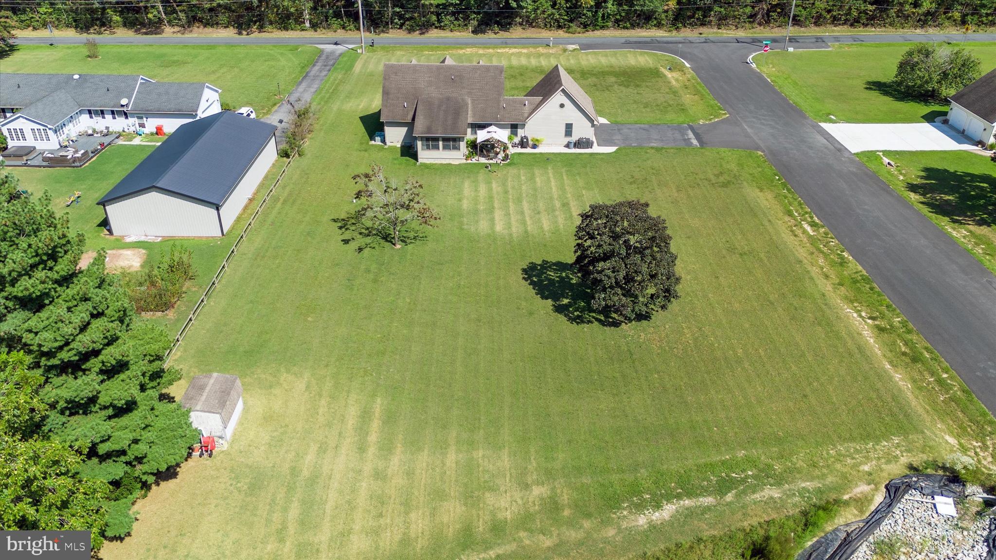 1265 Bowman Road Milford, DE 19963 - Photo 59 of 60 a view of a lake with a house in the background