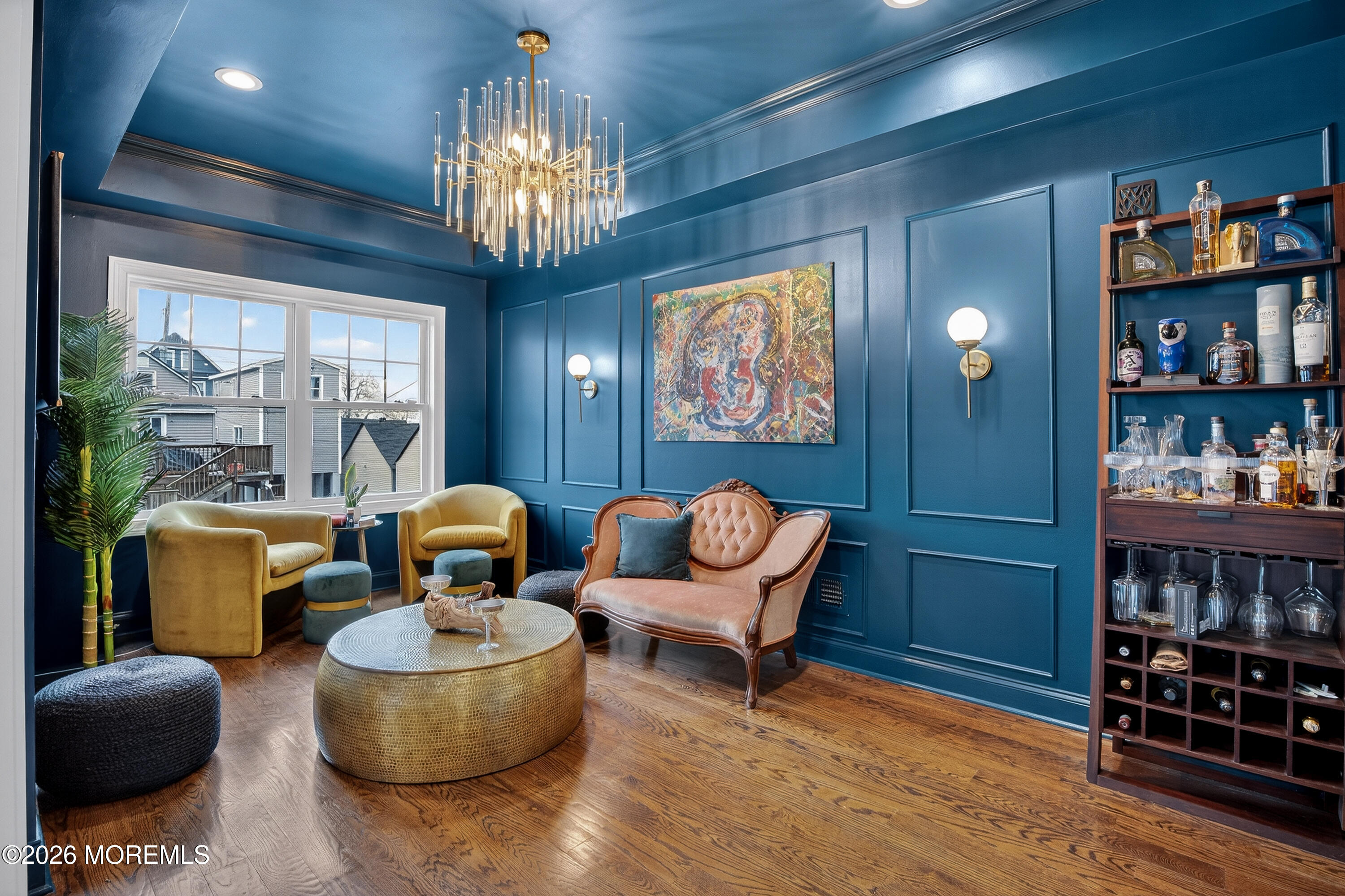 27 5th Street Highlands, NJ 07732 - Photo 15 of 62 a living room with furniture and a chandelier