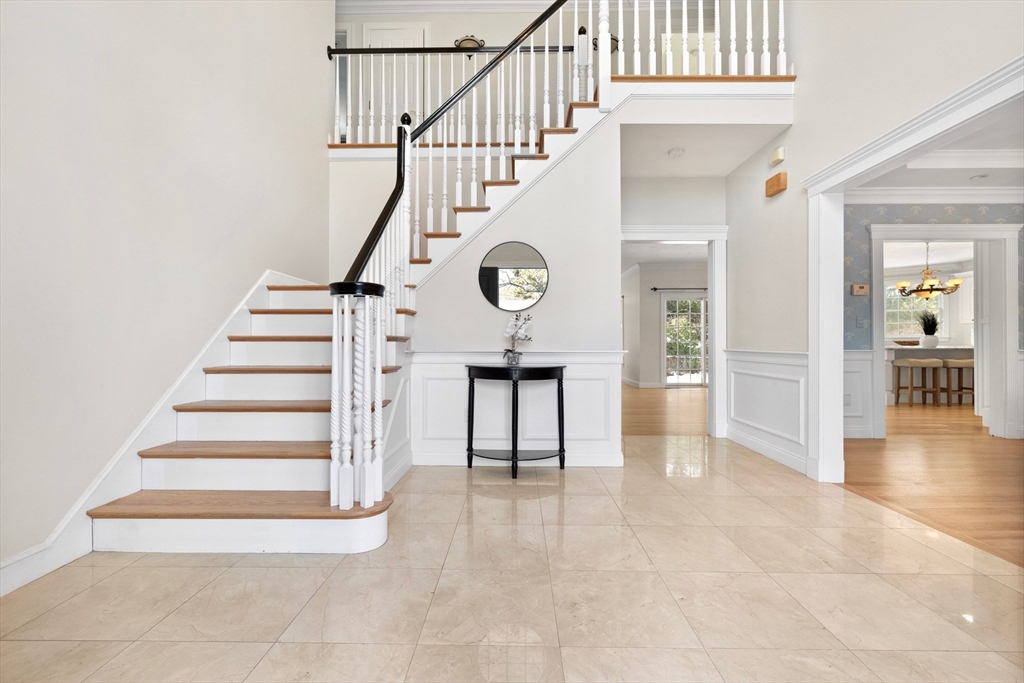 52 Chandler Circle Andover, MA 01810 - Photo 13 of 25 a view of entryway and hall with wooden floor