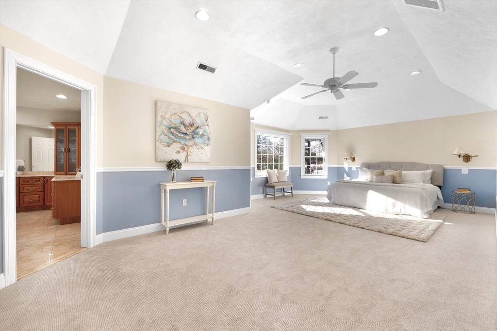 52 Chandler Circle Andover, MA 01810 - Photo 15 of 25 a living room with furniture and a chandelier