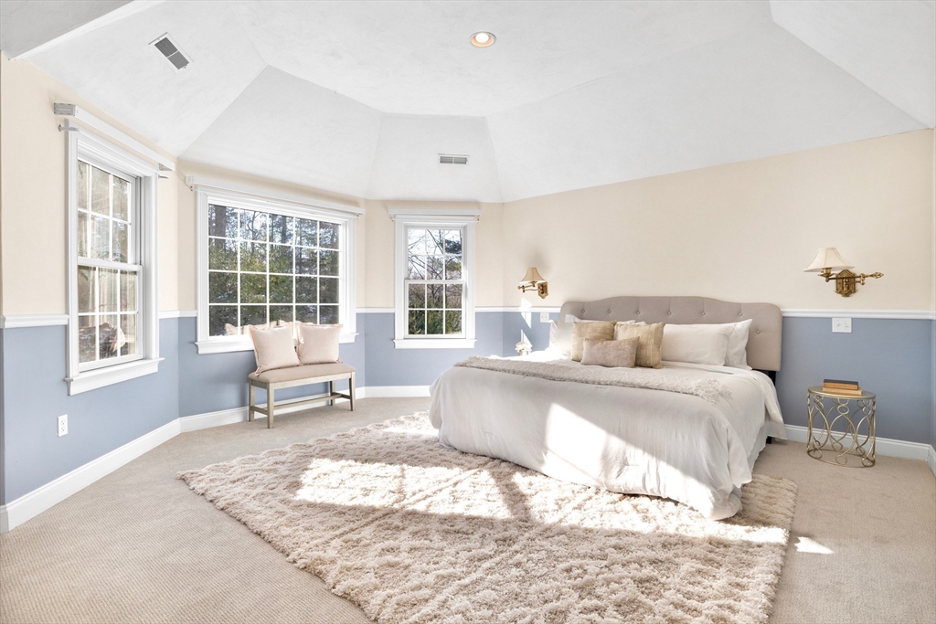 52 Chandler Circle Andover, MA 01810 - Photo 16 of 25 a bedroom with a bed and wooden floor