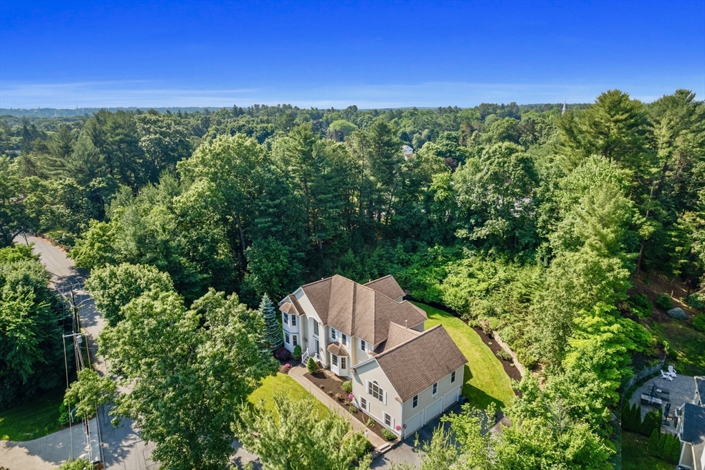 52 Chandler Circle Andover, MA 01810 - Photo 24 of 25 a view of a chair and table in the yard