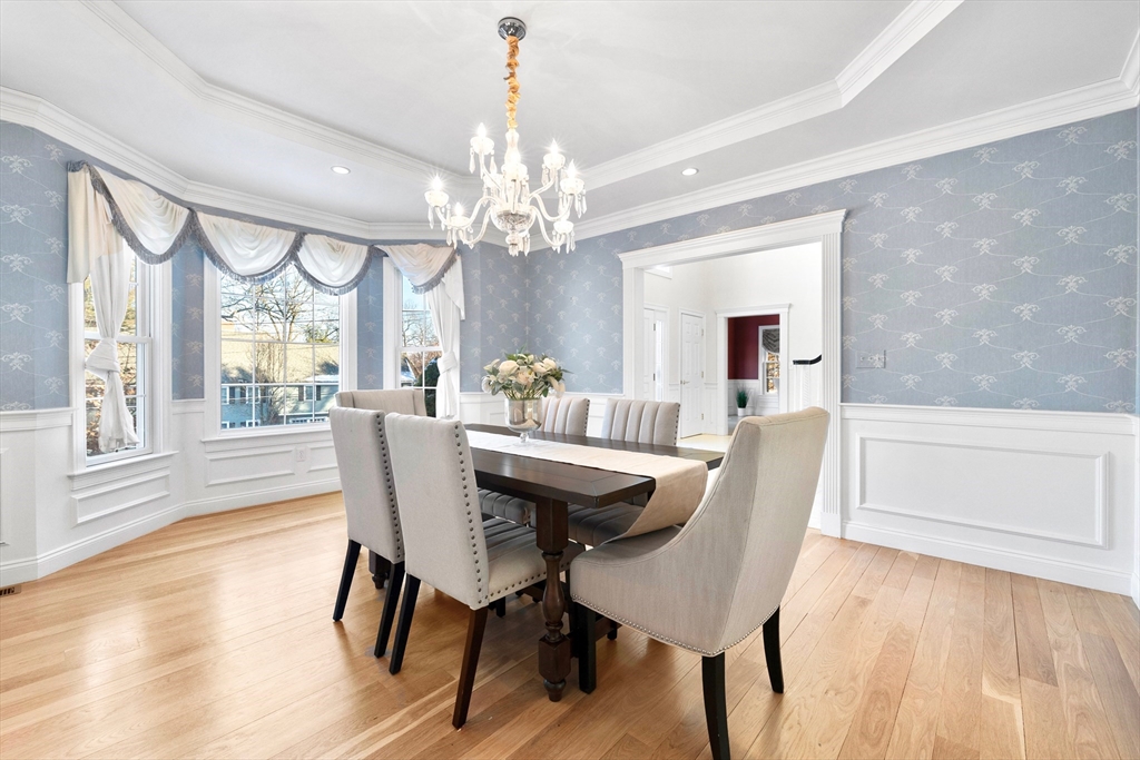 52 Chandler Circle Andover, MA 01810 - Photo 7 of 25 a view of a dining room with furniture window and wooden floor