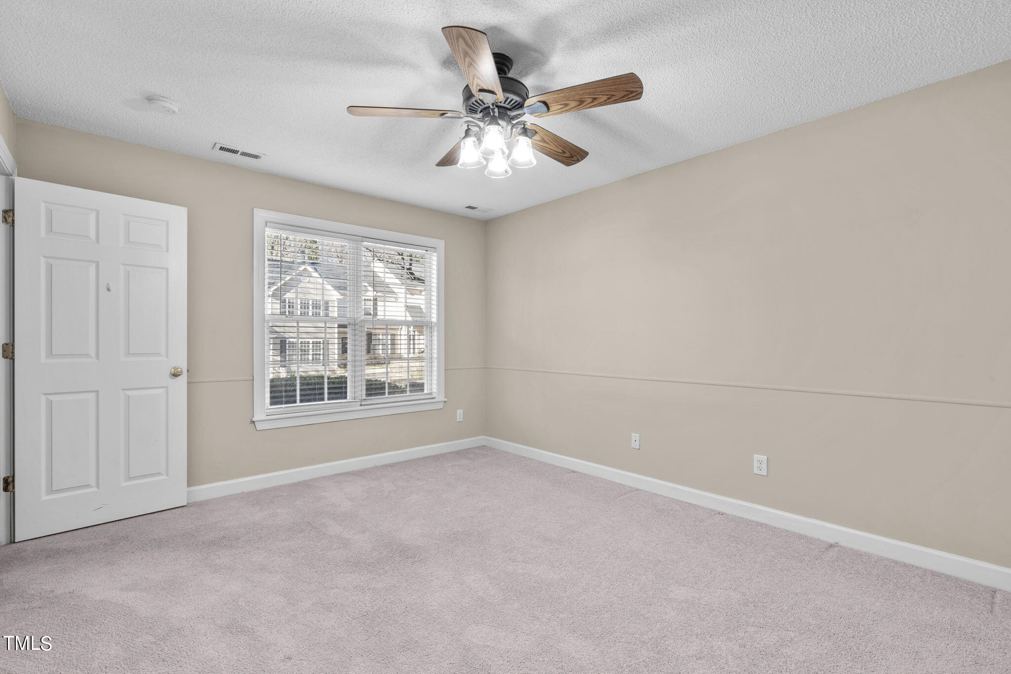 7320 Bonnie Ridge Court Raleigh, NC 27615 - Photo 12 of 29 1st Floor Primary Bedroom