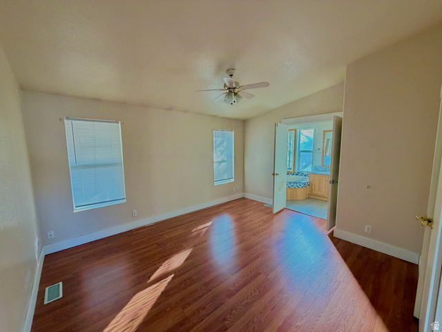 1025 North 300 West, Unit 1 Springville, UT 84663 - Photo 8 of 35 Spare room with wood finished floors, lofted ceiling, and ceiling fan