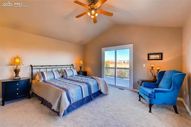 11974 Rio Secco Road Peyton, CO 80831 - Photo 11 of 29 Master bedroom with views of golf course.