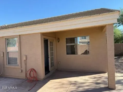 a house view with a backyard