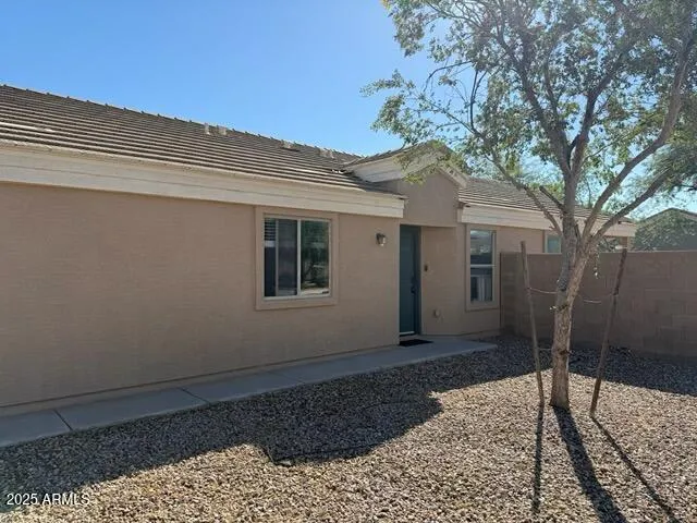 a house view with a outdoor space