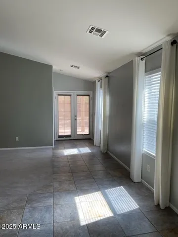 a view of entryway with kitchen