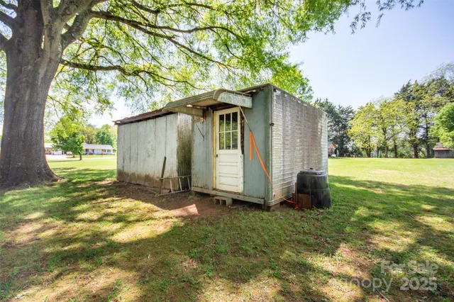a view of a trees in front of a house