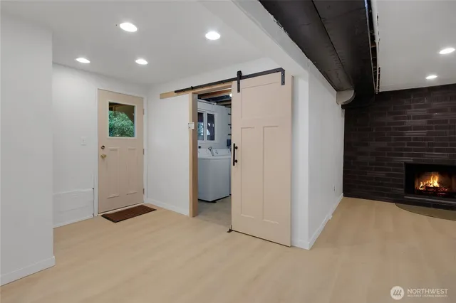 a backyard of a house with yard and outdoor seating