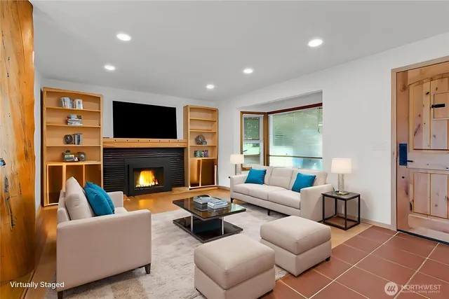 a kitchen with granite countertop a sink and a stove top oven
