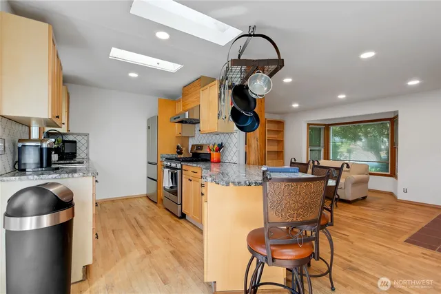 a view of a dining room with furniture window and outside view