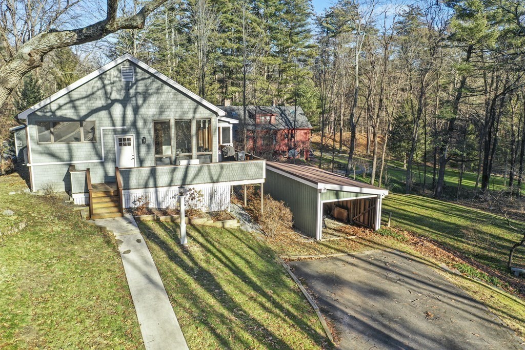 132 Pepperell Road Groton, MA 01450 - Photo 1 of 31 a view of a house with a yard