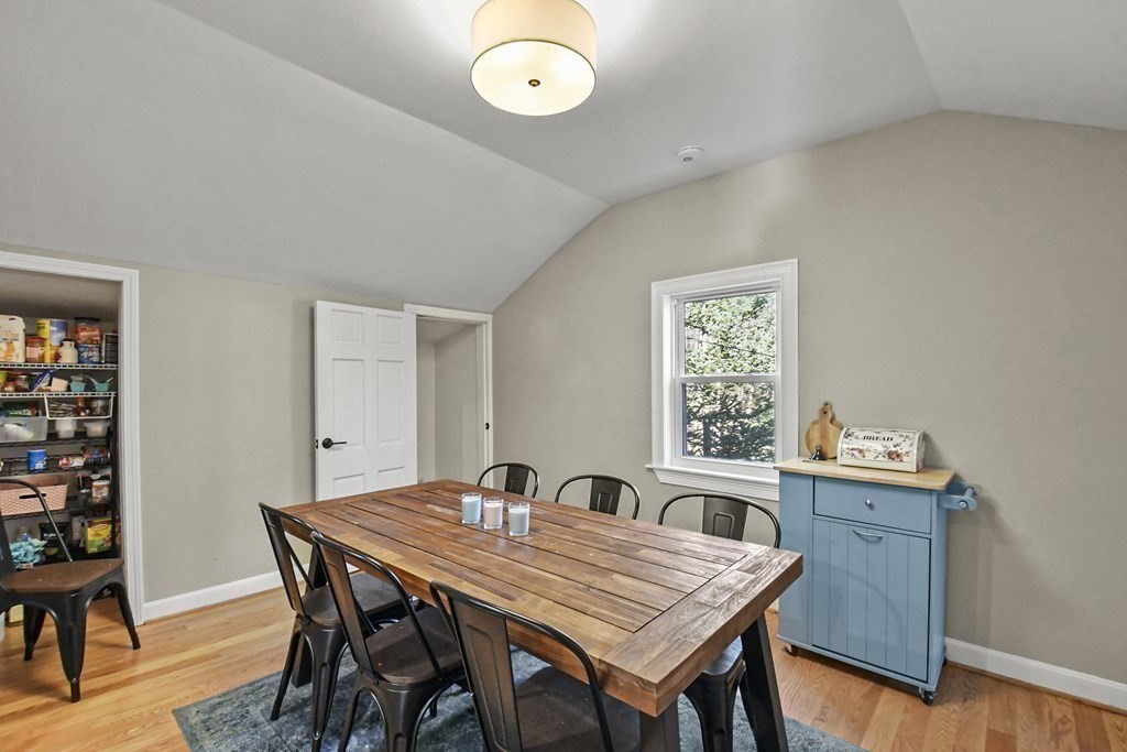 132 Pepperell Road Groton, MA 01450 - Photo 11 of 31 a view of a dining room with furniture and wooden floor