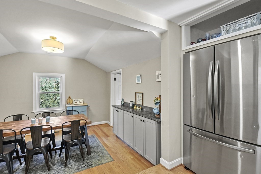 132 Pepperell Road Groton, MA 01450 - Photo 15 of 31 a kitchen with stainless steel appliances granite countertop a refrigerator and a dining table