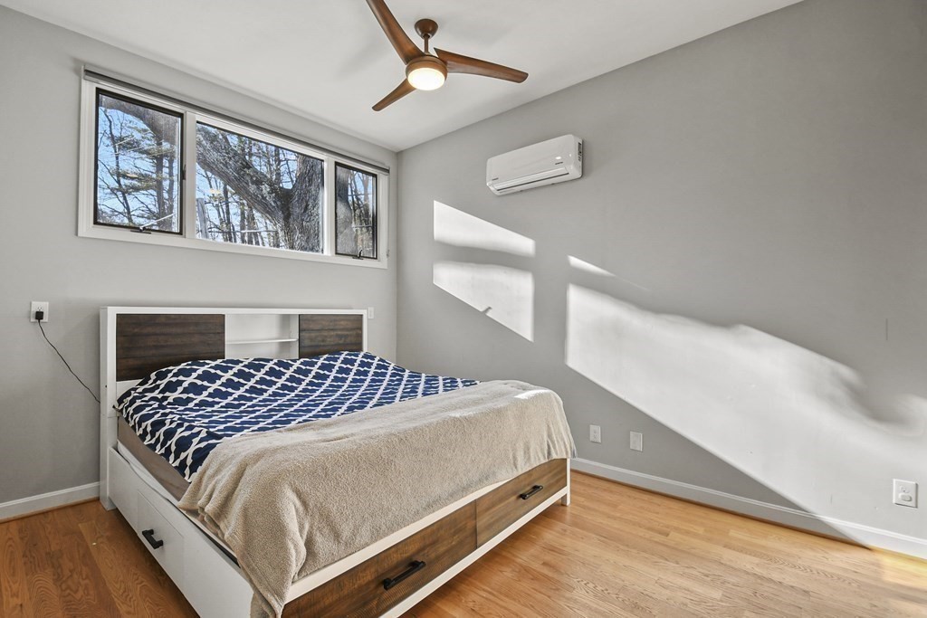 132 Pepperell Road Groton, MA 01450 - Photo 16 of 31 a bedroom with a bed and window