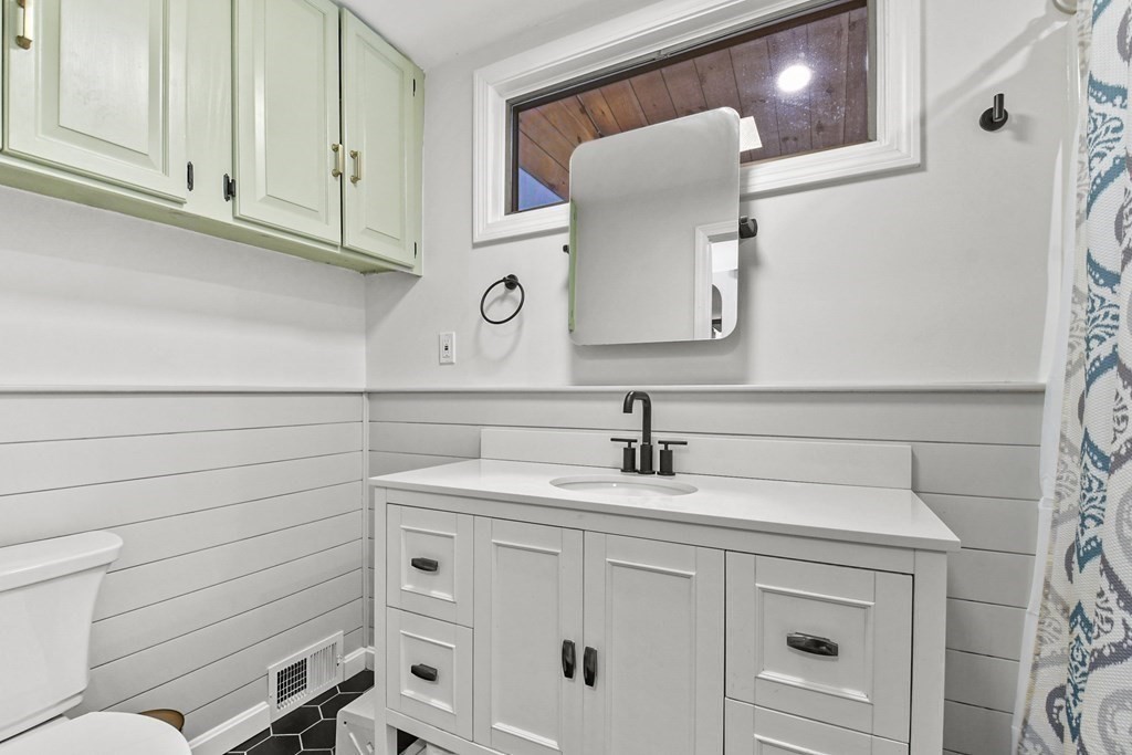 132 Pepperell Road Groton, MA 01450 - Photo 18 of 31 a bathroom with a sink and a mirror