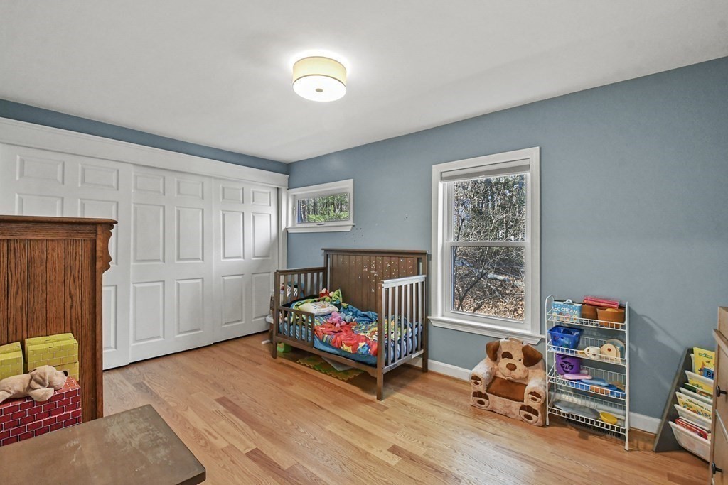 132 Pepperell Road Groton, MA 01450 - Photo 20 of 31 a living room with furniture and a wooden floor