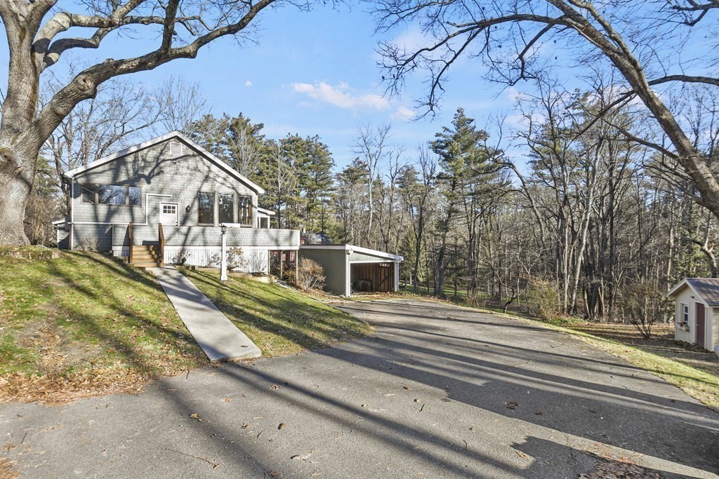 132 Pepperell Road Groton, MA 01450 - Photo 2 of 31 a view of a house with a yard