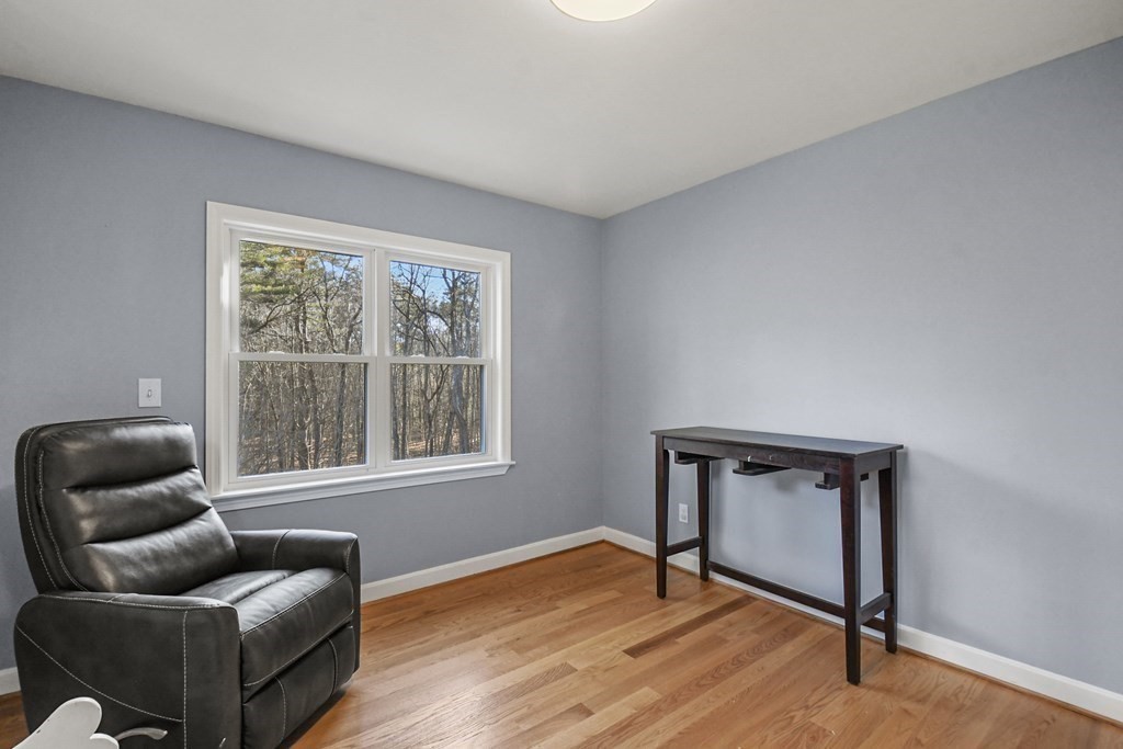 132 Pepperell Road Groton, MA 01450 - Photo 23 of 31 a room with furniture and a window