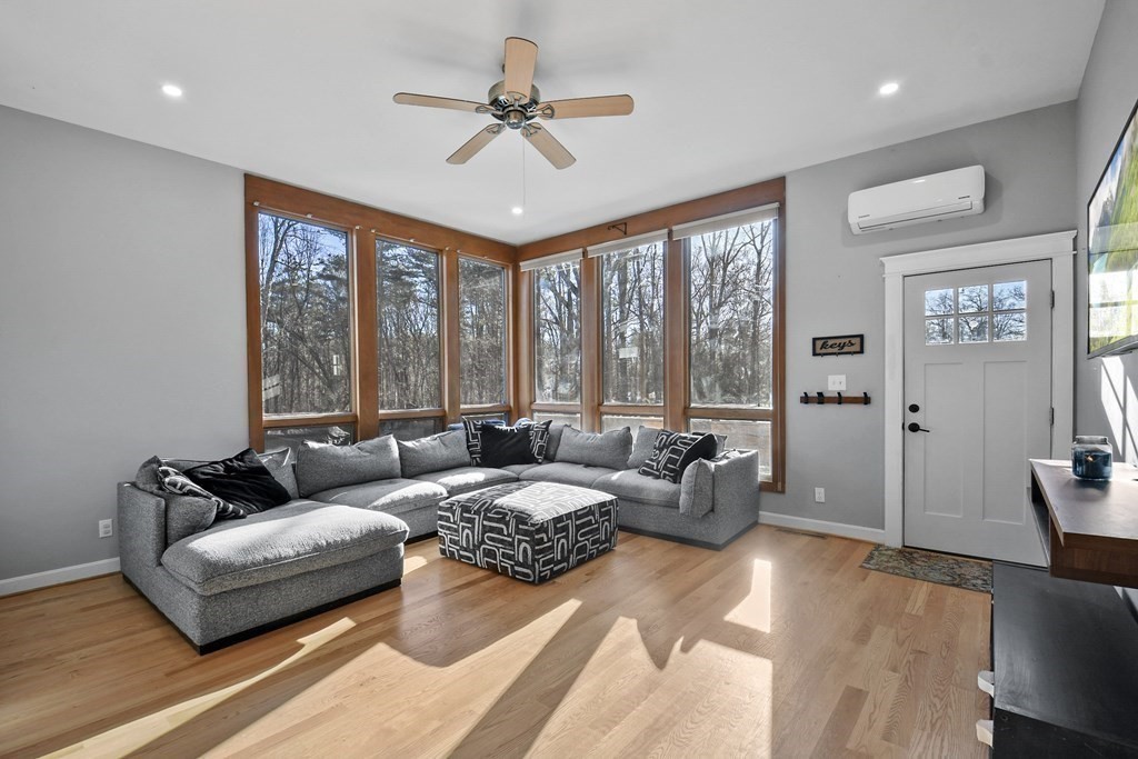 132 Pepperell Road Groton, MA 01450 - Photo 3 of 31 a living room with furniture and a large window