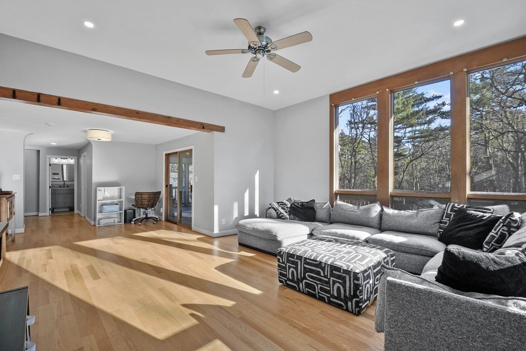 132 Pepperell Road Groton, MA 01450 - Photo 4 of 31 a living room with furniture and large windows