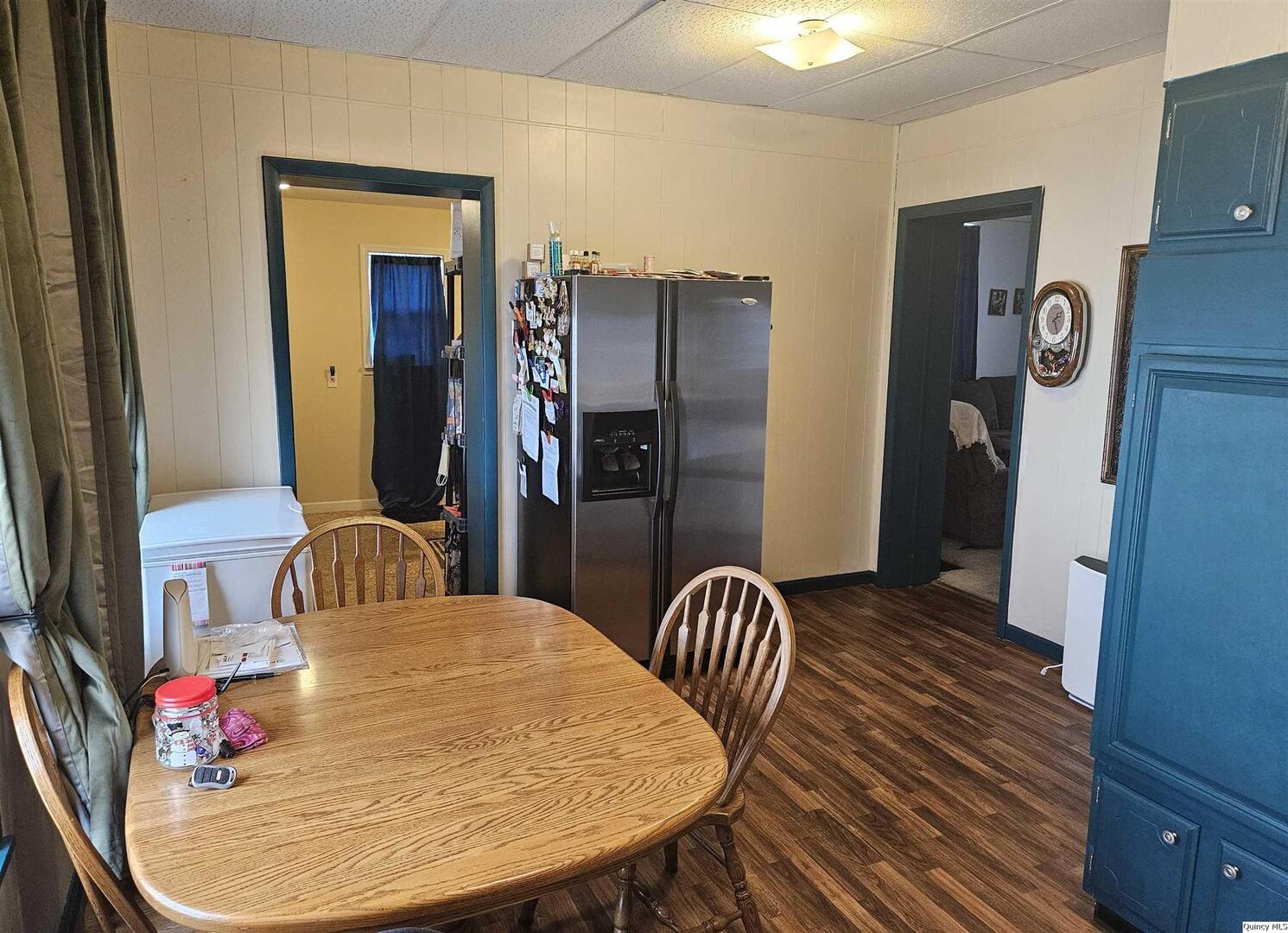 933 Adams Street Quincy, IL 62301 - Photo 10 of 26 a view of a dining room with furniture