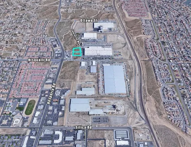 an aerial view of a building with outdoor space