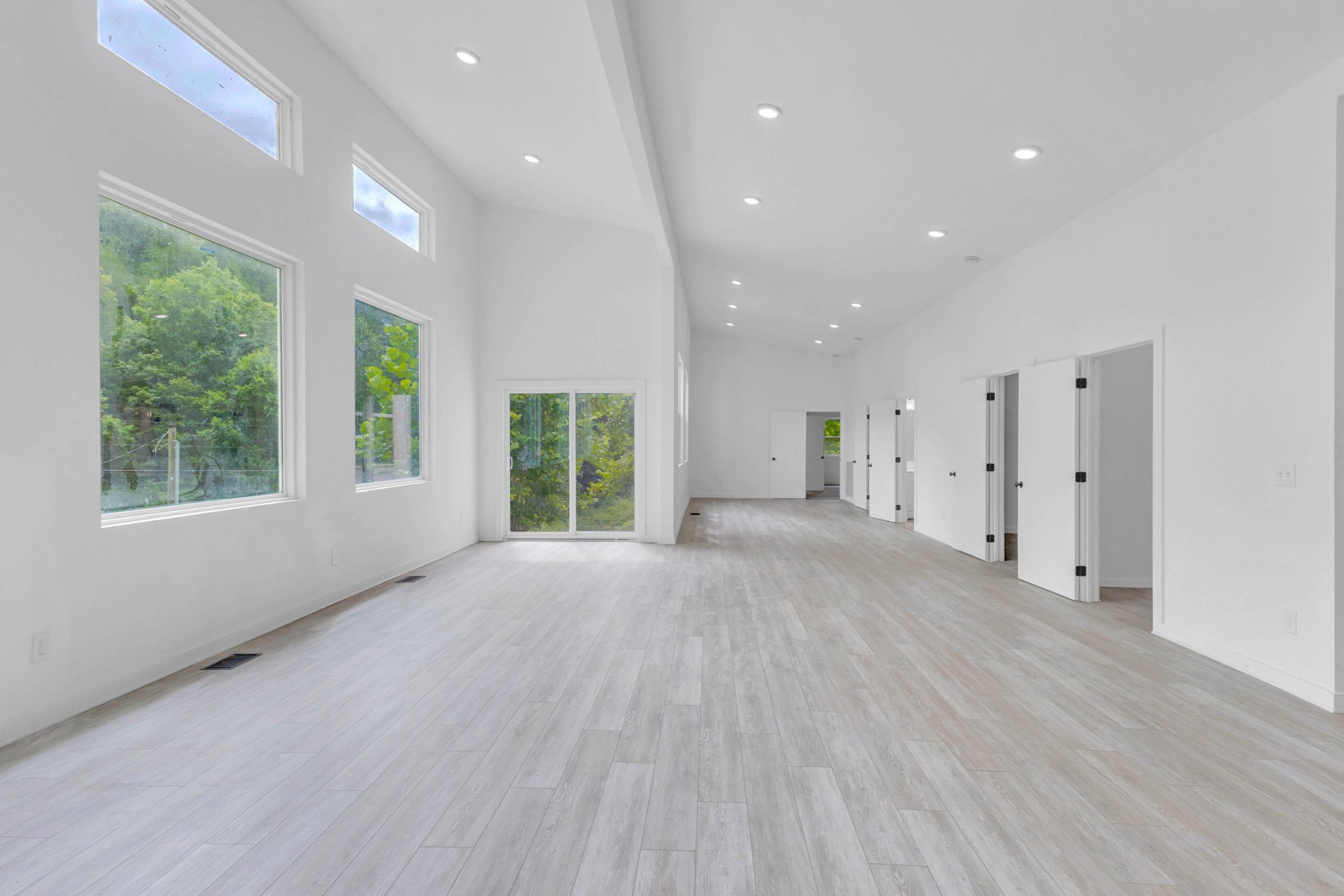 515 Big Branch Road Granville, TN 38564 - Photo 20 of 76 a view of a big room with wooden floor and windows