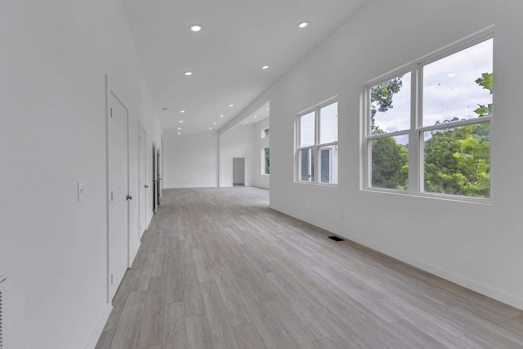 515 Big Branch Road Granville, TN 38564 - Photo 26 of 76 a view of hallway with wooden floor and windows