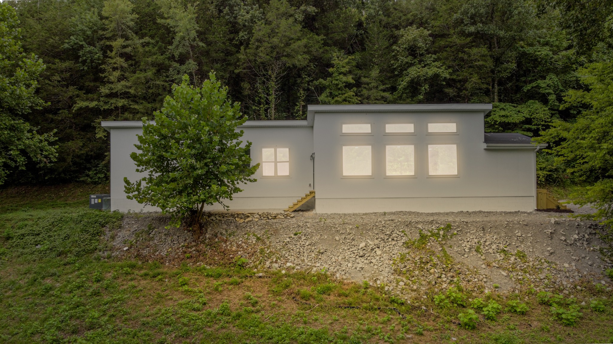 515 Big Branch Road Granville, TN 38564 - Photo 3 of 76 a front view of a house with a garden