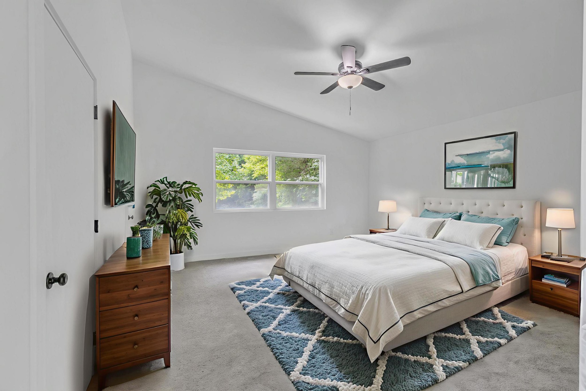 515 Big Branch Road Granville, TN 38564 - Photo 31 of 76 a bedroom with a bed table and a window