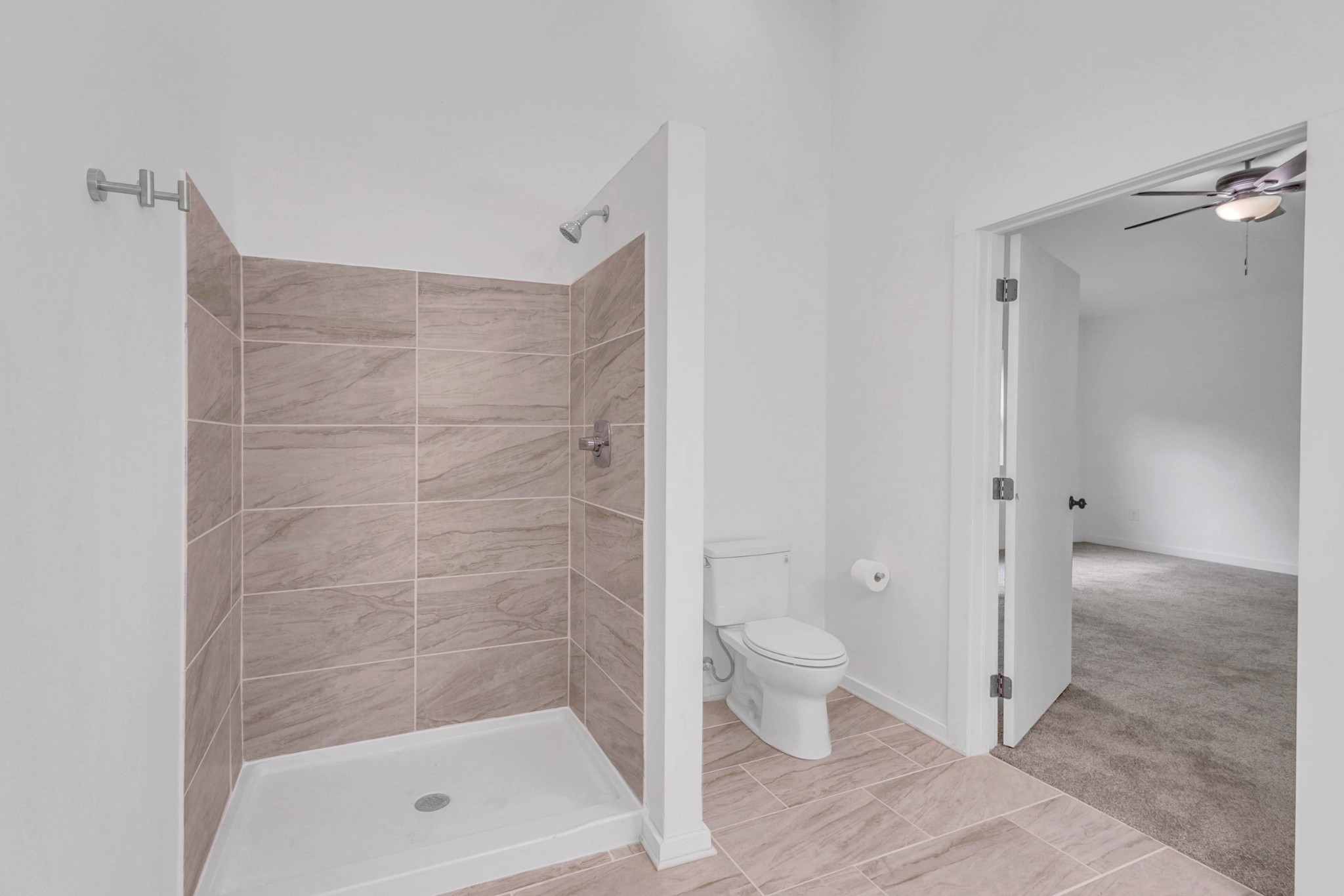 515 Big Branch Road Granville, TN 38564 - Photo 38 of 76 a bathroom with a shower and a toilet