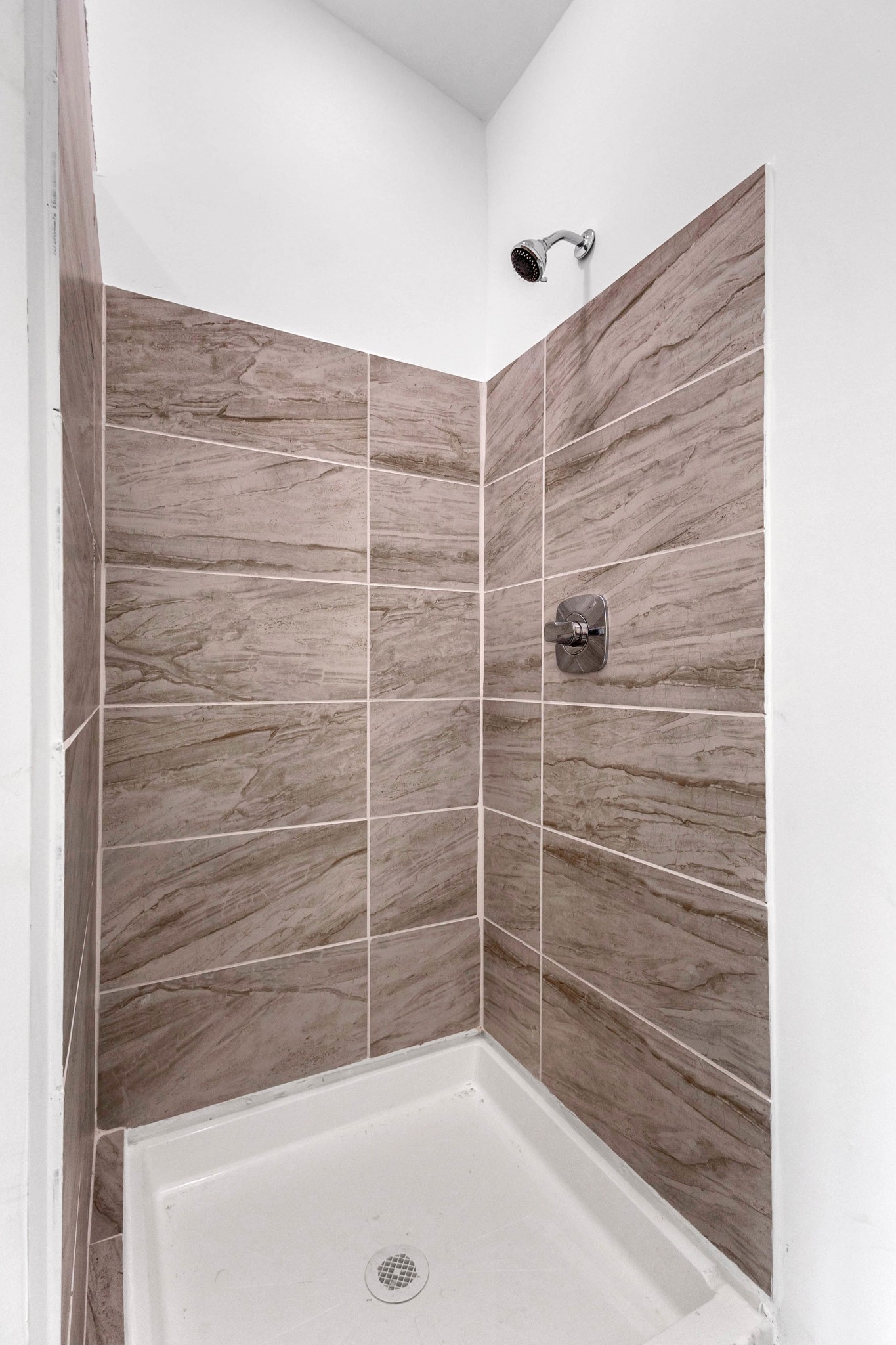 515 Big Branch Road Granville, TN 38564 - Photo 40 of 76 a bathroom with a shower and a bathtub