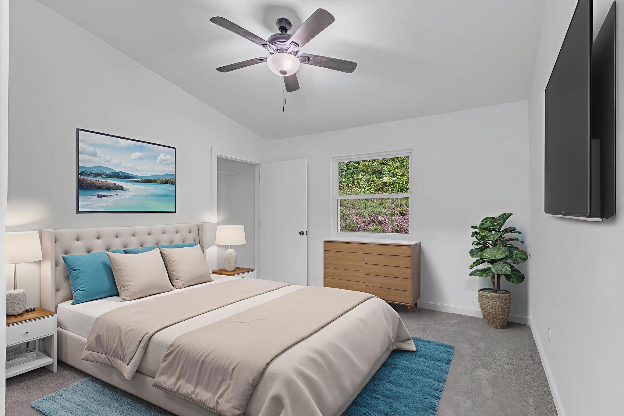 515 Big Branch Road Granville, TN 38564 - Photo 43 of 76 a bedroom with a large bed and a chandelier