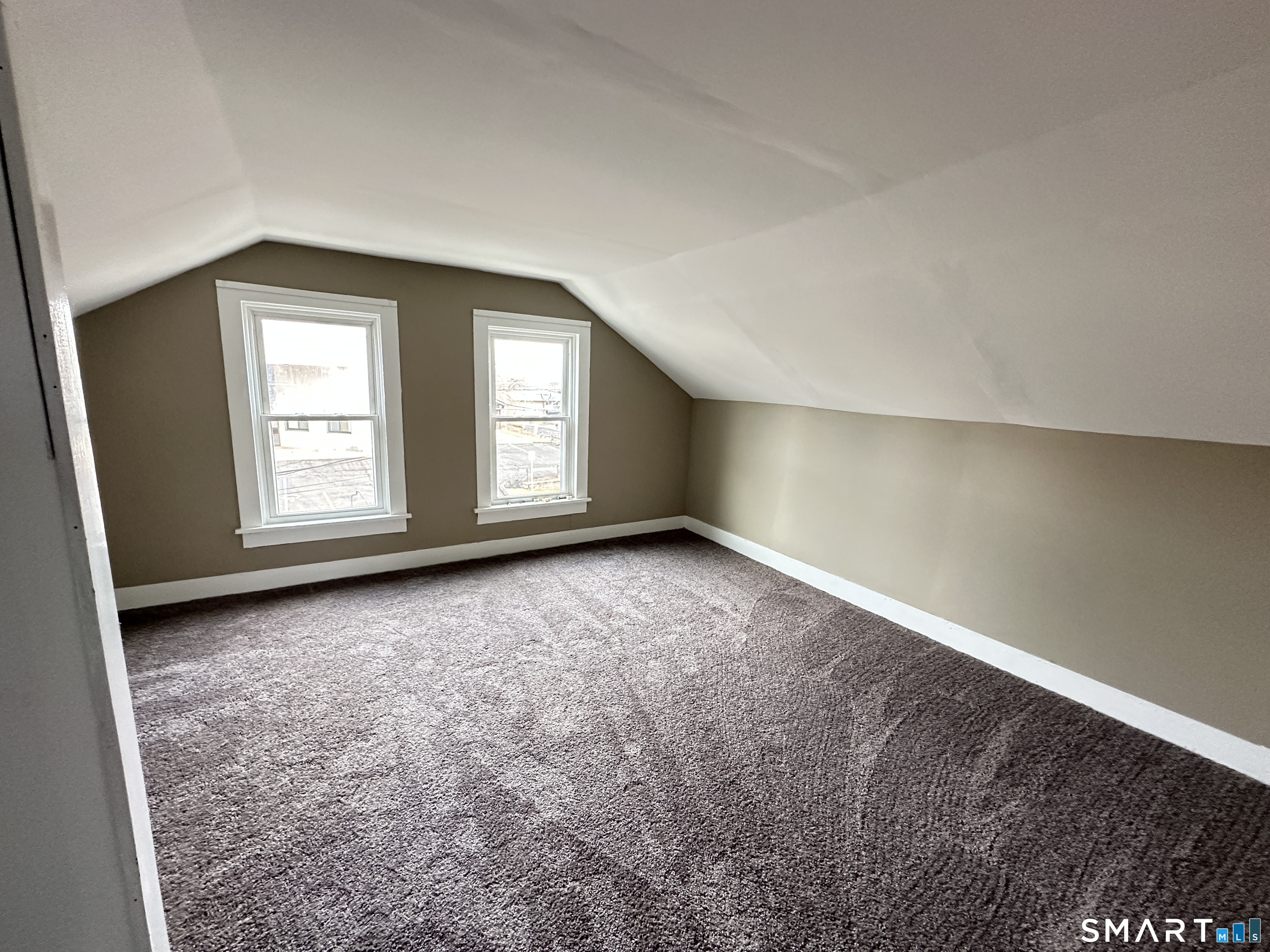 40 Oak Street, Unit 1 Windsor Locks, CT 06096 - Photo 14 of 21 an empty room with windows