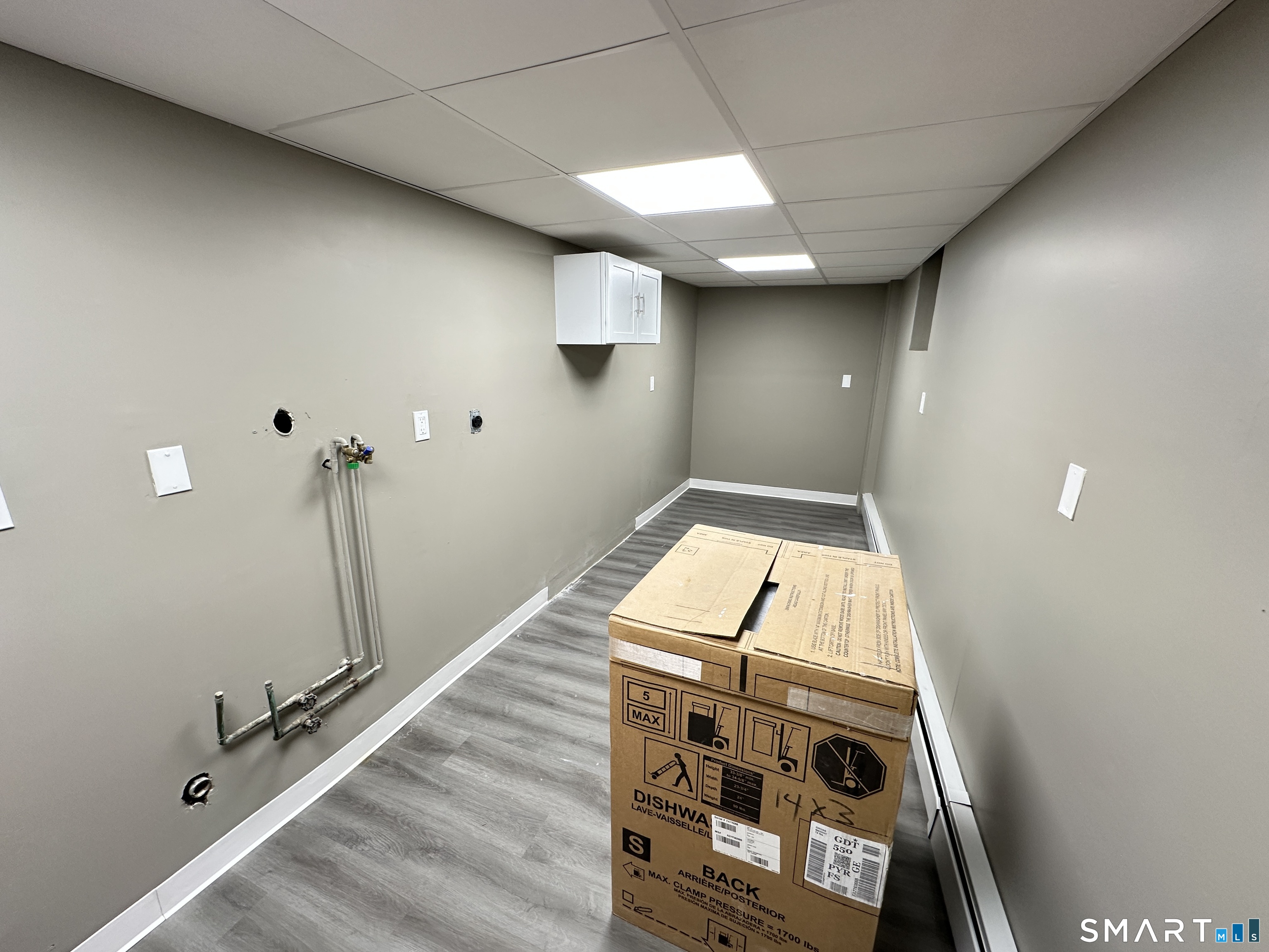 40 Oak Street, Unit 1 Windsor Locks, CT 06096 - Photo 7 of 21 a view of a hallway with staircase