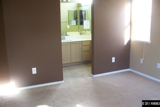 1700 Northrup Court Reno, NV 89521 - Photo 10 of 11 a view of an empty room with a window