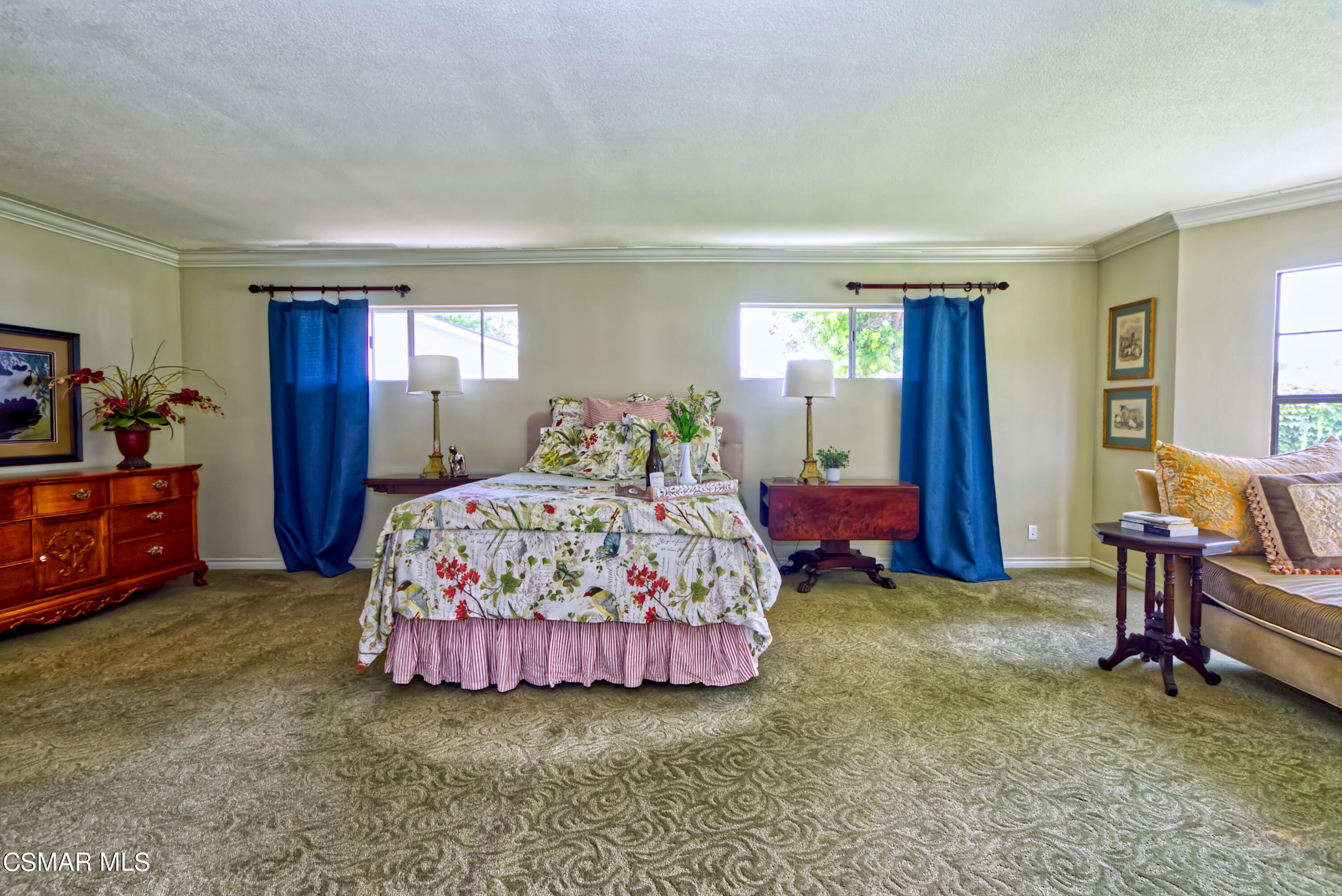 4888 Mira Sol Drive Moorpark, CA 93021 - Photo 17 of 39 a bedroom with bed and large windows