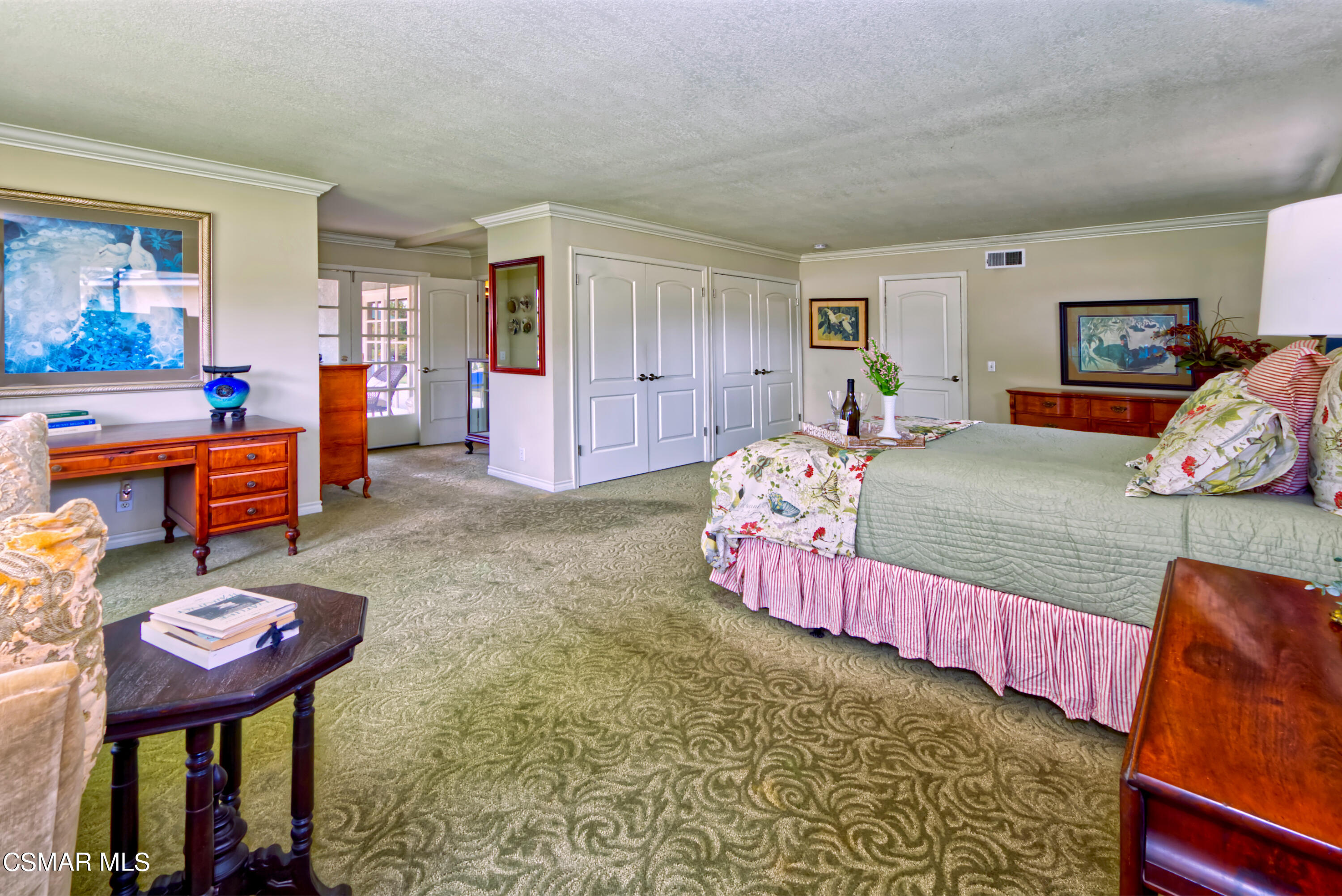 4888 Mira Sol Drive Moorpark, CA 93021 - Photo 18 of 39 a bedroom with furniture and a wooden floor