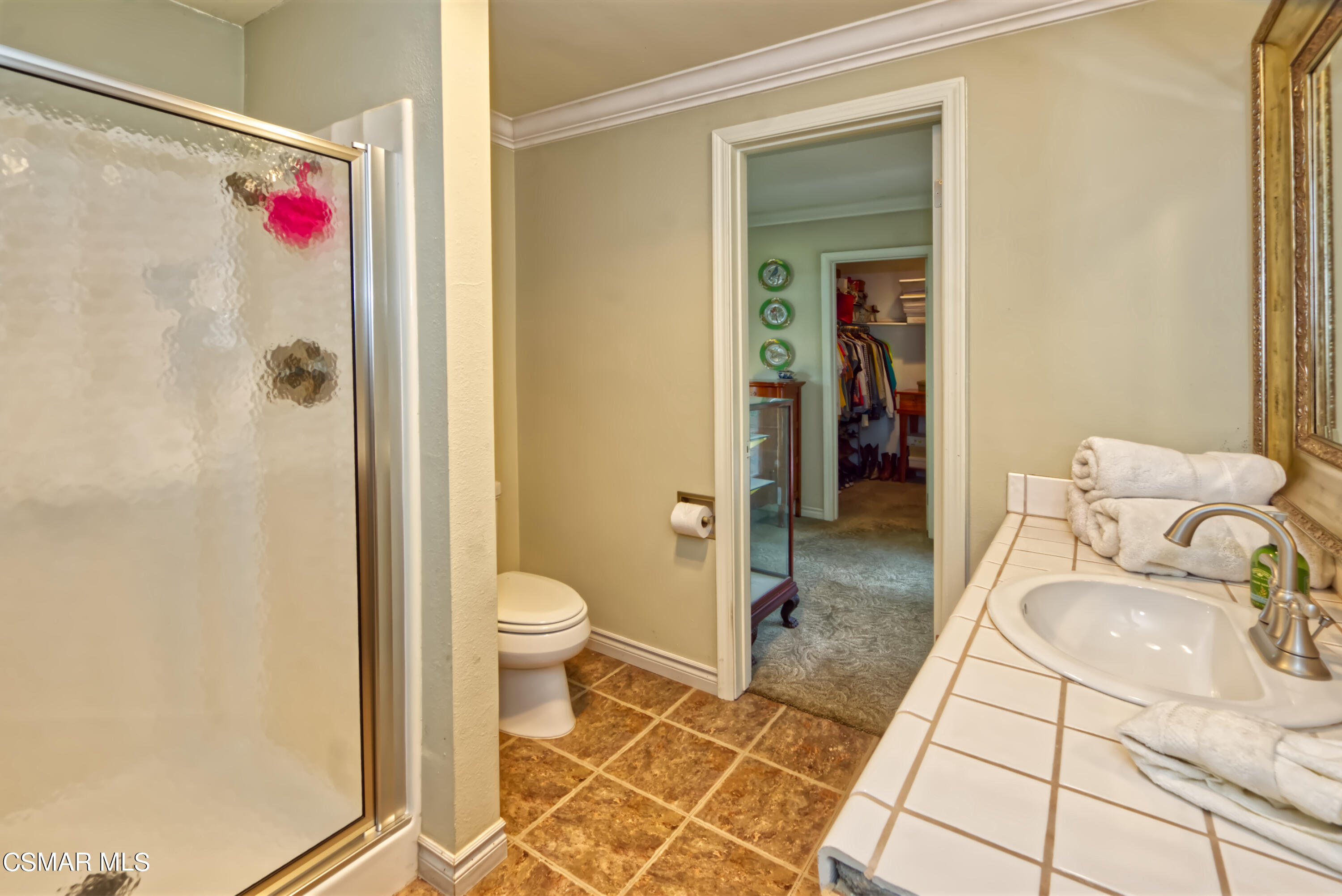 4888 Mira Sol Drive Moorpark, CA 93021 - Photo 19 of 39 a bathroom with a sink toilet and shower