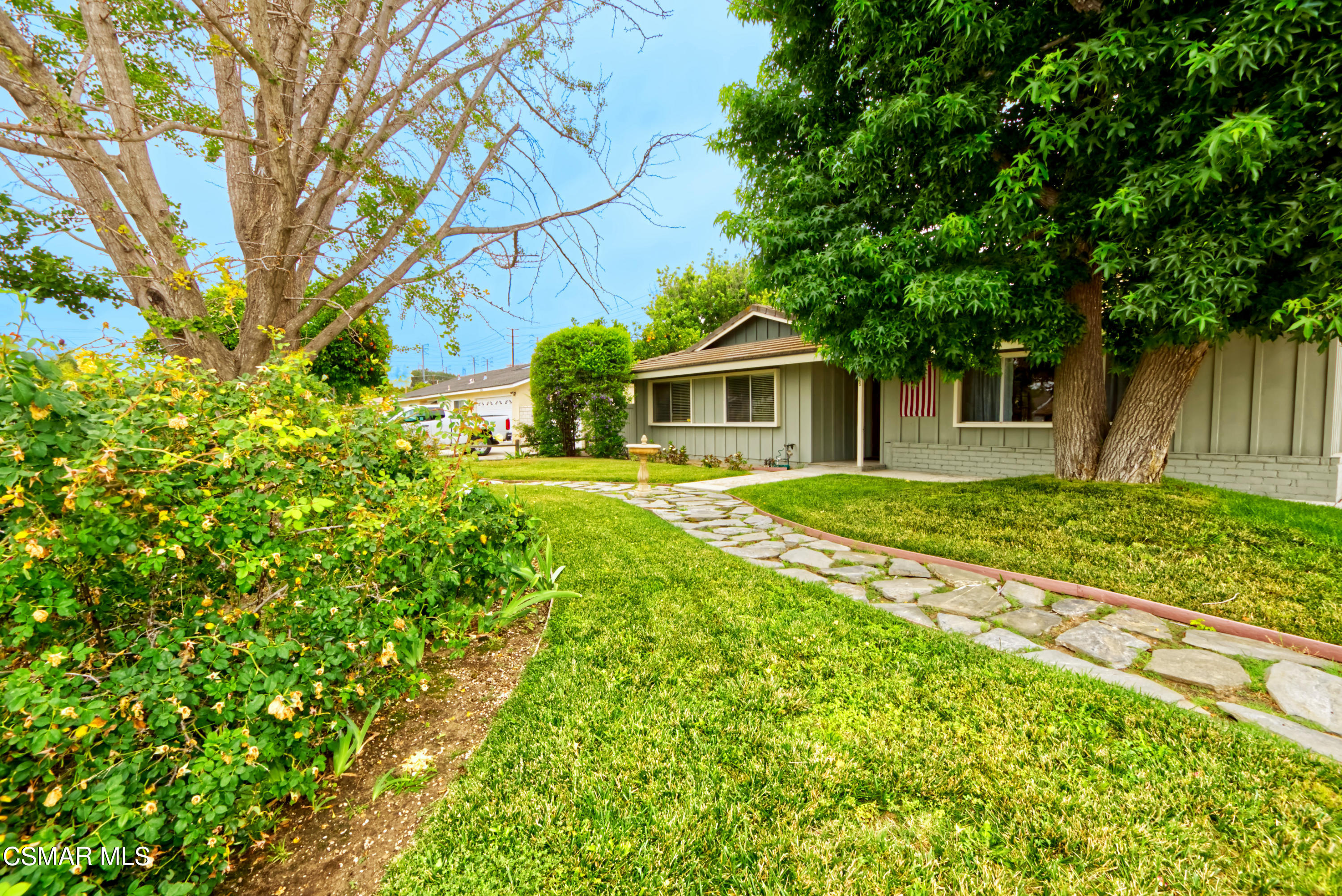 4888 Mira Sol Drive Moorpark, CA 93021 - Photo 4 of 39 a front view of a house with a yard