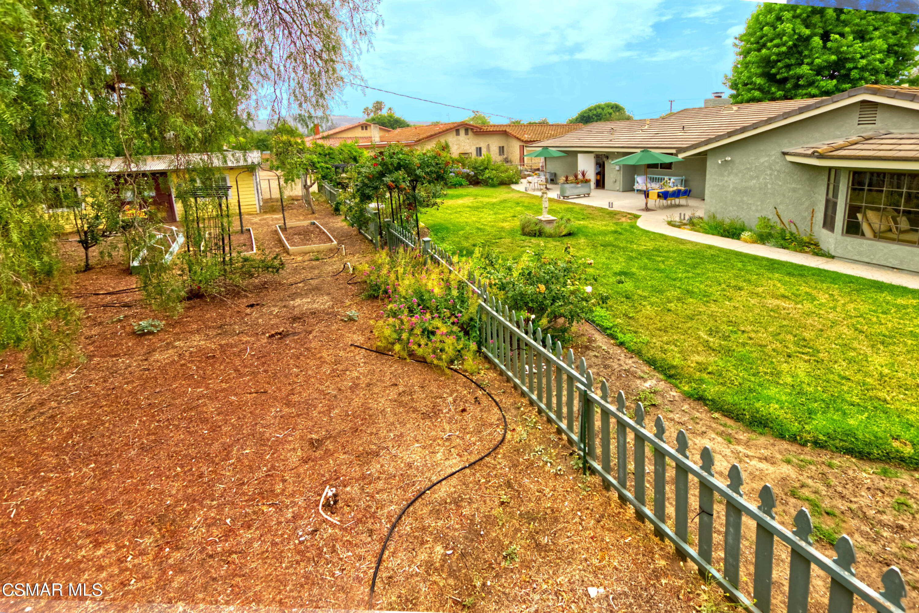 4888 Mira Sol Drive Moorpark, CA 93021 - Photo 33 of 39 a view of a house with a yard