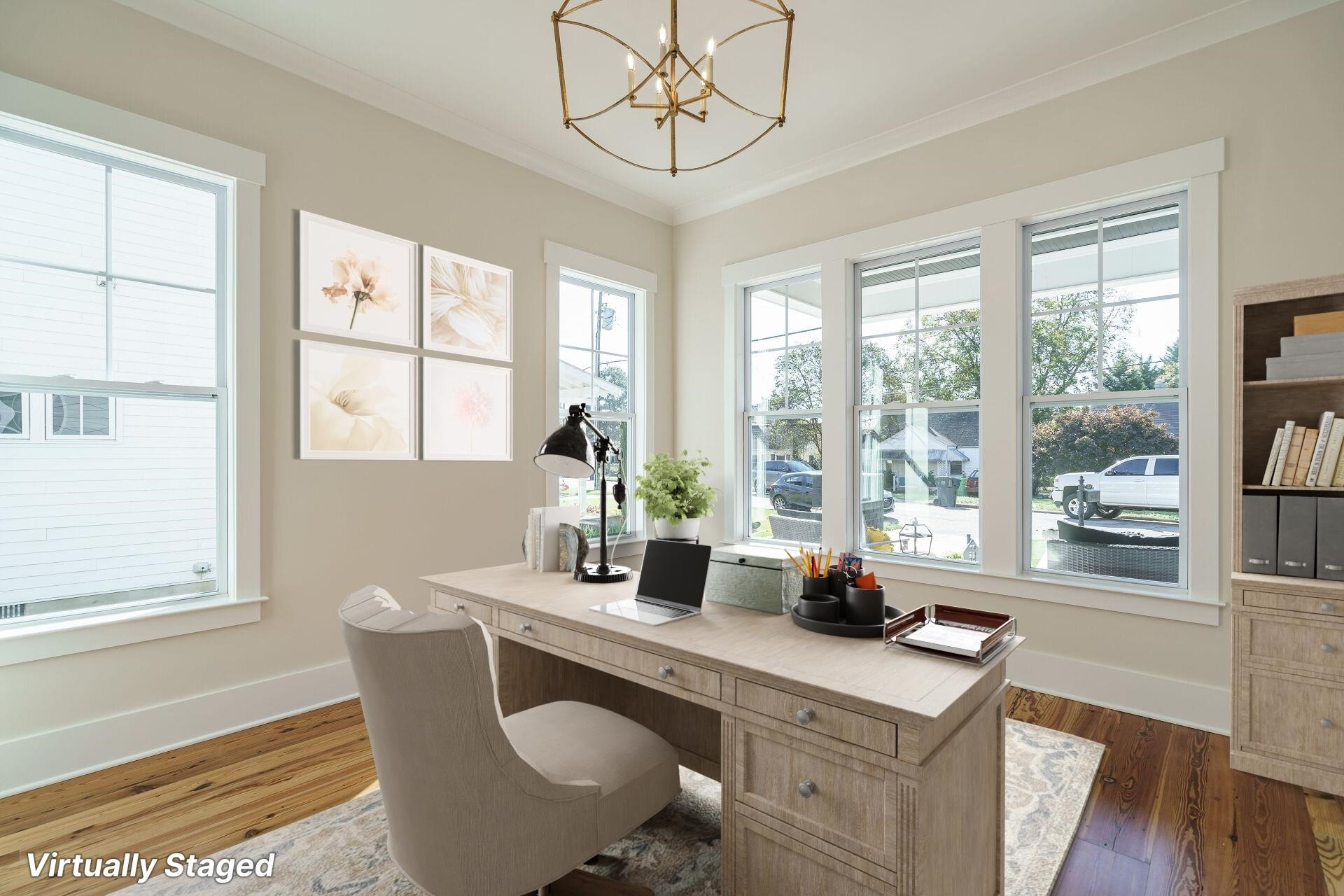 213 Georgetown Road Raleigh, NC 27608 - Photo 13 of 44 a dining room with wooden floor and a chandelier
