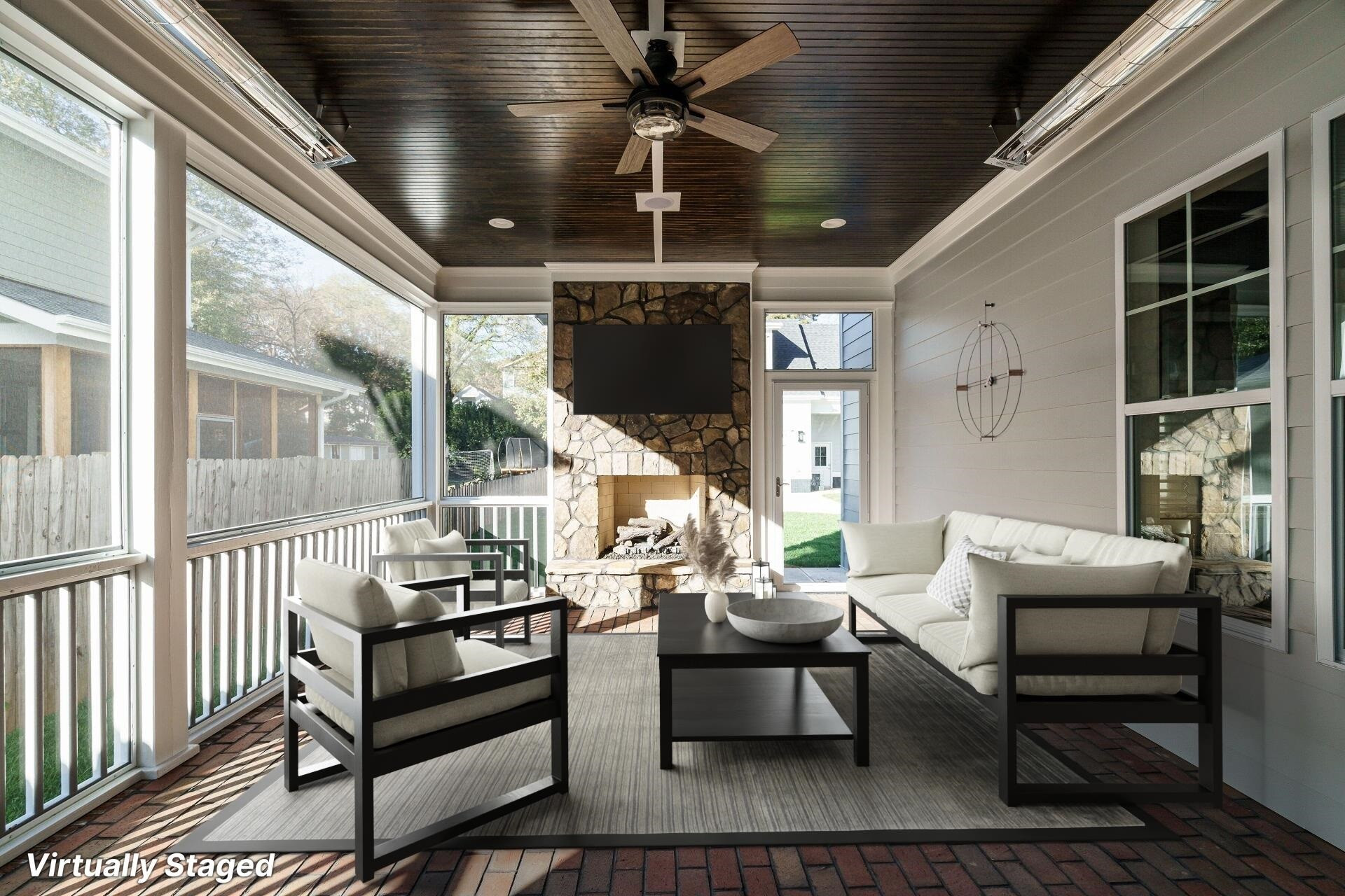 213 Georgetown Road Raleigh, NC 27608 - Photo 33 of 44 a outdoor living space with patio furniture and a chandelier