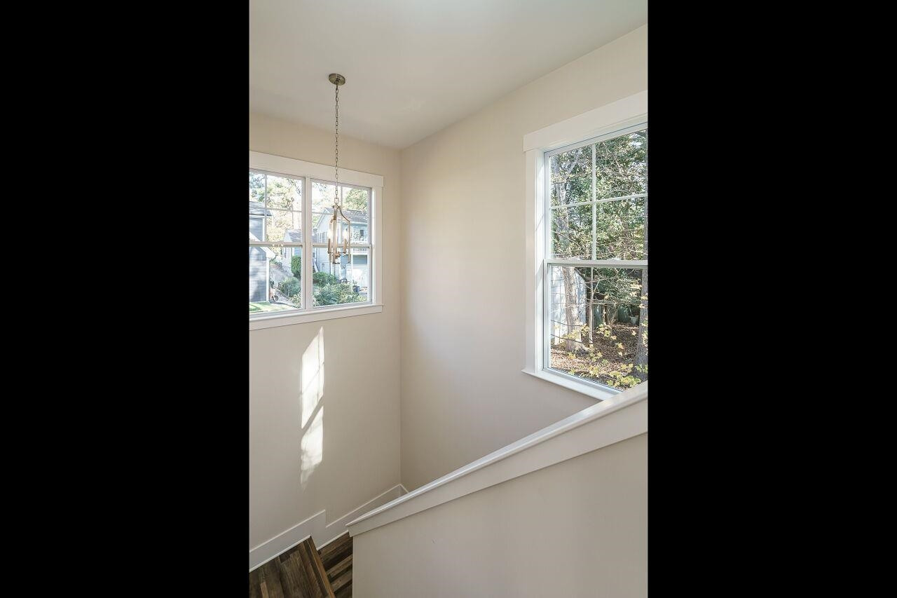 213 Georgetown Road Raleigh, NC 27608 - Photo 37 of 44 a view of an empty room with a window