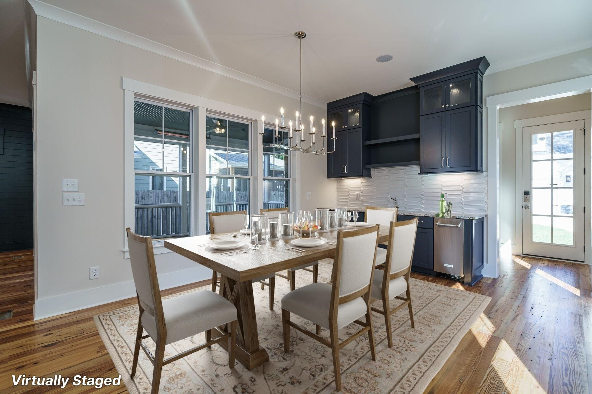213 Georgetown Road Raleigh, NC 27608 - Photo 10 of 44 a view of a dining room with furniture window and wooden floor