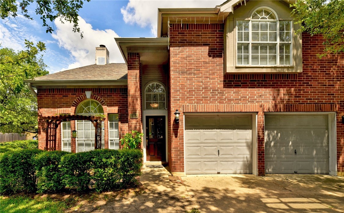 6008 Roxbury Lane Austin, TX 78739 - Photo 1 of 1 front view of a house with a yard