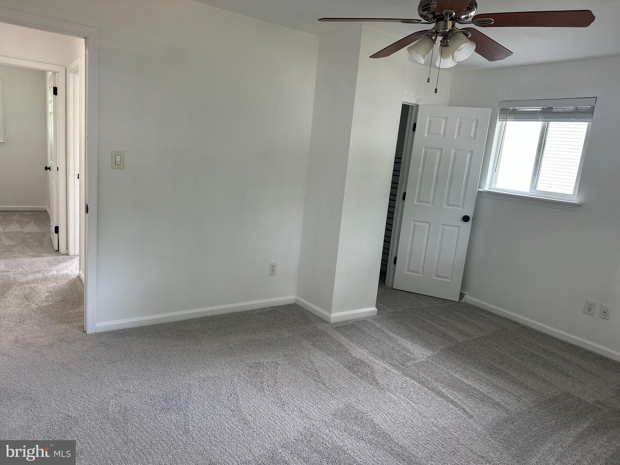 6 Travertine Way Newark, DE 19702 - Photo 15 of 22 an empty room with windows and fan